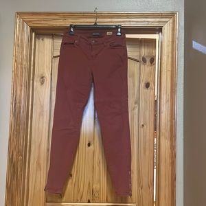 maroon jeans, brand is level 99, type is janice ultra skinny